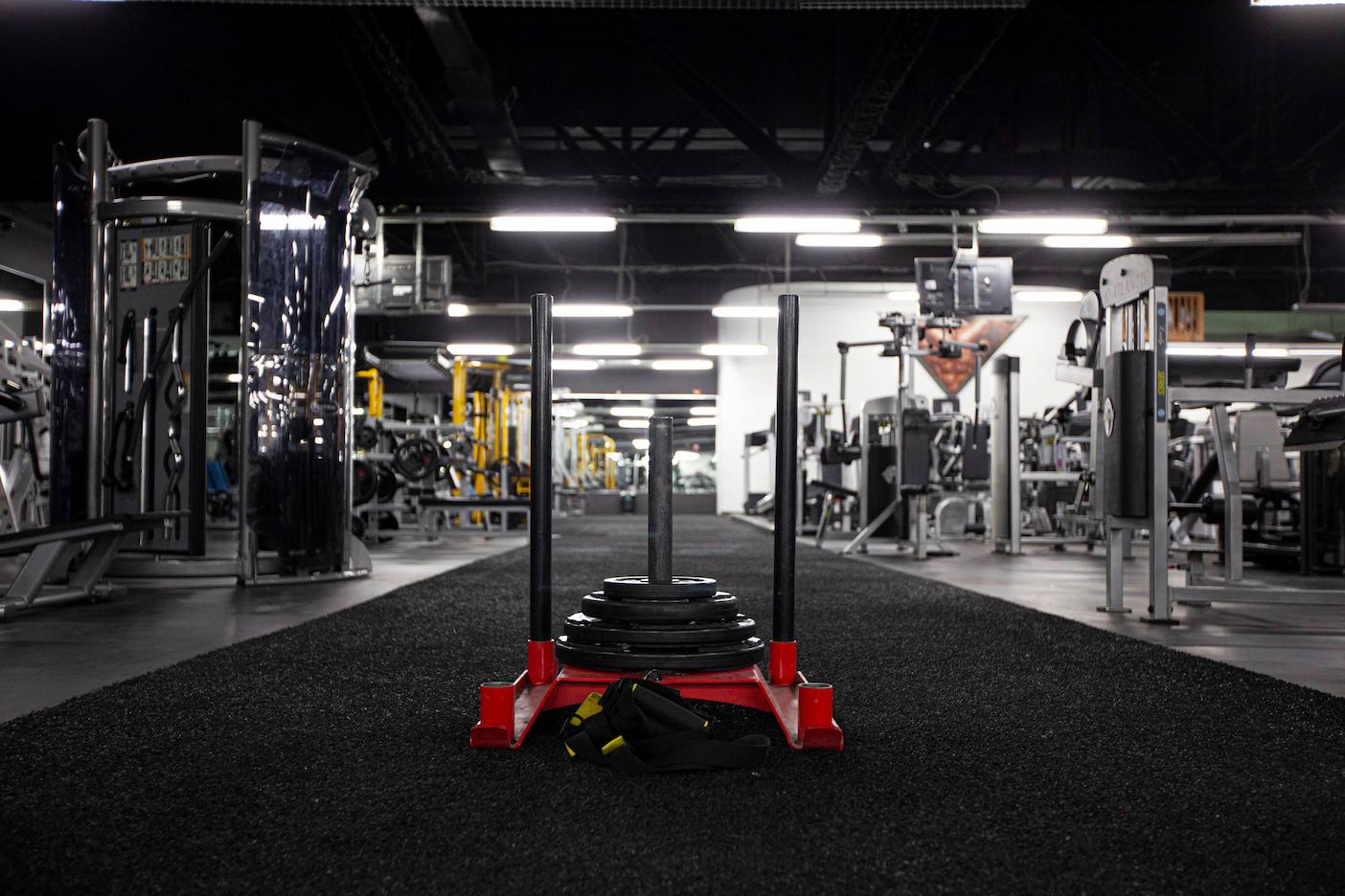 training sled and machines in gym